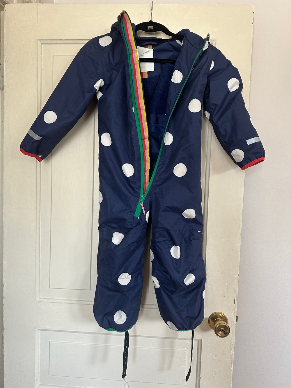 Mini Boden Navy and White Polka Dot One-Piece Rain Suit with Rainbow Trim